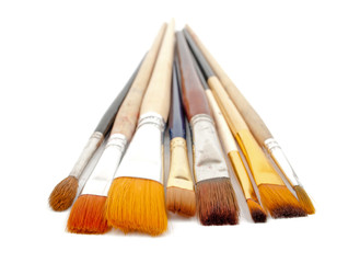 Fototapeta premium paint brushes on a white background.