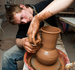 potter, creating an earthen jar on the circle