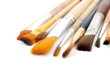 Fototapeta premium paint brushes on a white background.