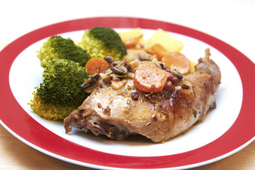 Braised rabbit with potatoes and broccoli