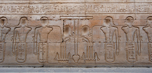 Egyptian engraved image on wall in Kom Ombo temple, Egypt