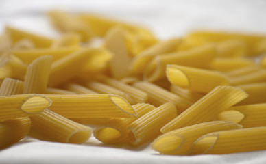 dried italian pasta (macaroni) isolated on white background