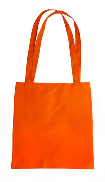 small orange cotton bag isolated on white