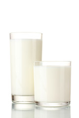 Two glass of milk isolated on white