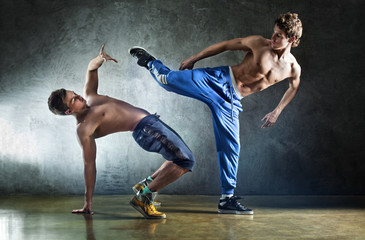 Two young men sports fighting