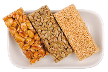 Honey bars with peanuts, sesame and sunflower seeds