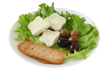 toasts with cheese and olives on plate