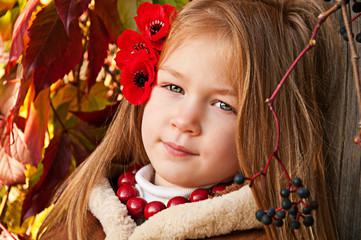 Naklejka premium A beautiful blonde little girl, portrait.