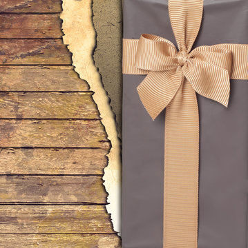gift box with ribbon on on wooden background