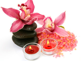 Pink orchids and candles