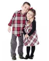 Boy and Girl embracing in studio