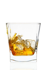 Whiskey glass. Isolated on white with reflection