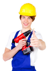 handwerker mit akkuschrauber zeigt daumen hoch