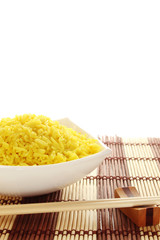 Plate of rice and wood sticks