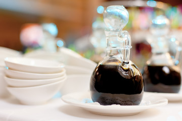 Bottles of soy sauce on a table