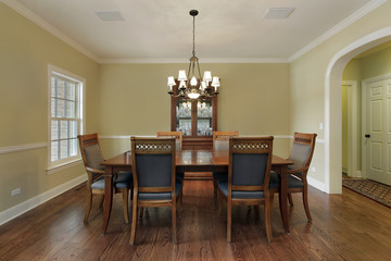Dining room with gold walls