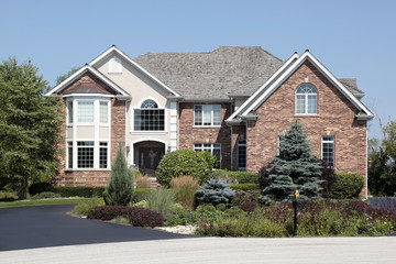 Brick home with front landscaping