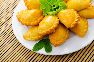 Plate full of tasty meat patties