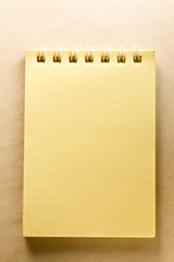 Notepad on the paper background