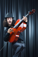 Fototapeta premium Man playing the cello