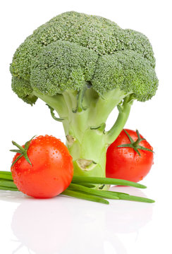 Broccoli, Two Tomato with drops and Fresh Scallions Isolated on