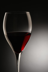 red wine glass isolated on black background
