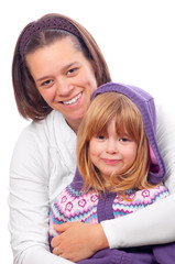 Mother and daughter isolated on white background