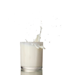 Glass of milk with a splash isolated on white