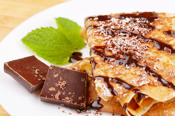 Crepes with chocolate sauce