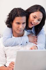 Fototapeta premium Couple spending time online together