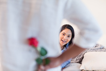 Female about to get a rose by her boyfriend