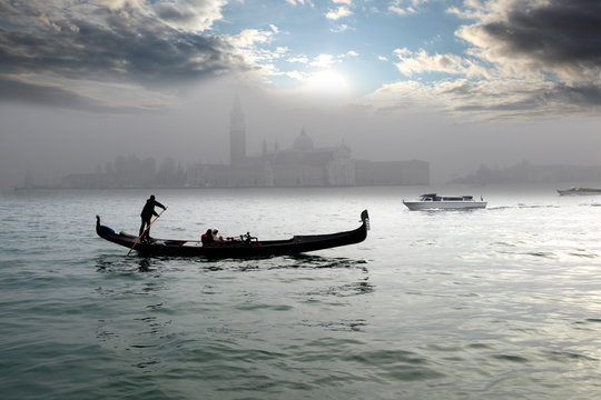 Fototapeta Venice with gondola on canal in Italy