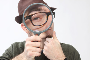 Man with magnifying glass.