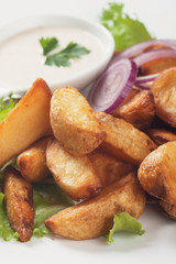 Fried potato wedges