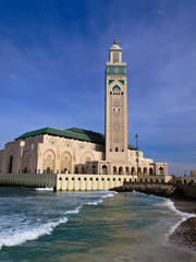 LPanorama of Ornate Hassan II Mosque against blue sky © Pete Niesen Photo
