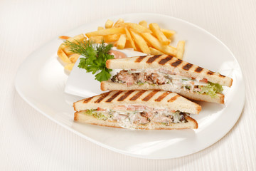 Sandwiches with French fried potatoes