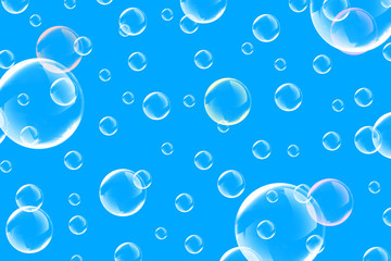 Soap bubbles on a blue background