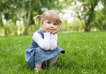 Portrait of a little girl outdoors