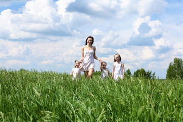 family with children in summer day outdoors