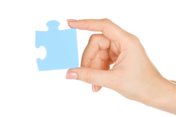 Blue puzzle with a hand isolated on white