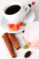 Cake and white cup isolated on white