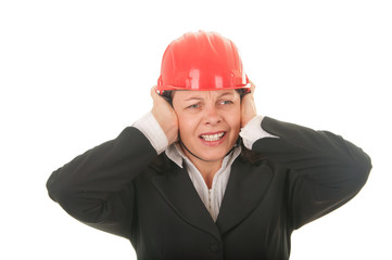 women with a protective helmet, the noise bothers