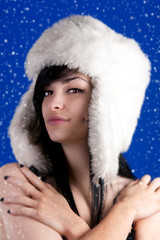 Beautiful girl with fur hat