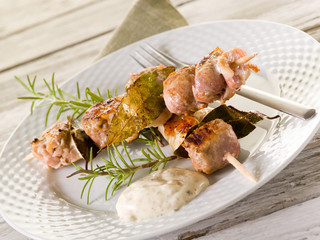 mixed meat skewer with  mustard