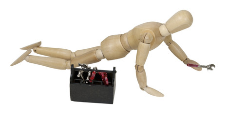On Hands and Knees with Wrench and Toolbox