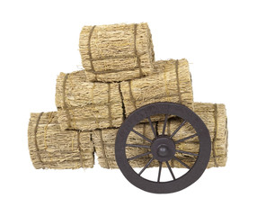 Stagecoach Wheel Leaning on Bales of Hay