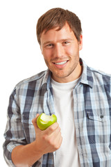 Young man with apple