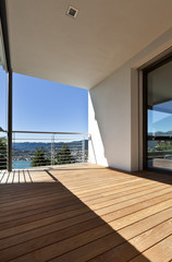 Modern apartment, balcony overlooking the lake