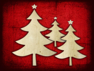 Fototapeta na wymiar Abstract paper christmas tree on Grunge Red wall for background