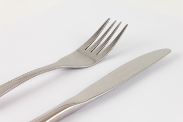 Fork and knife on gray background